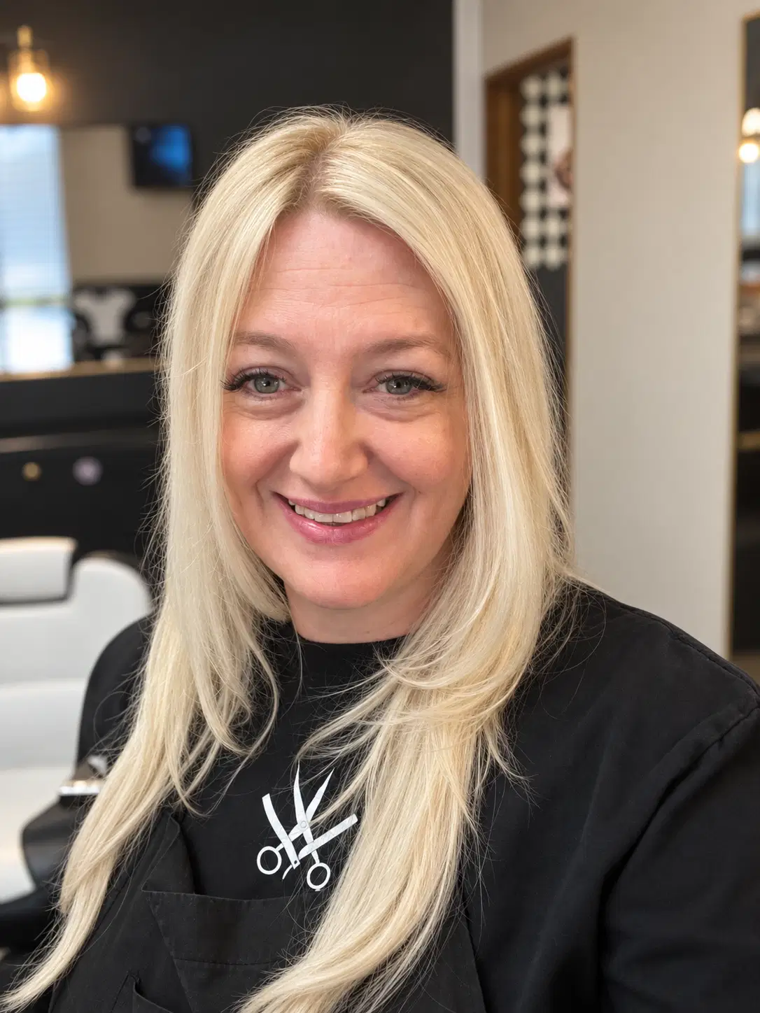 Sherri Coco, cosmetologist at Uppercuts Barber & Beauty